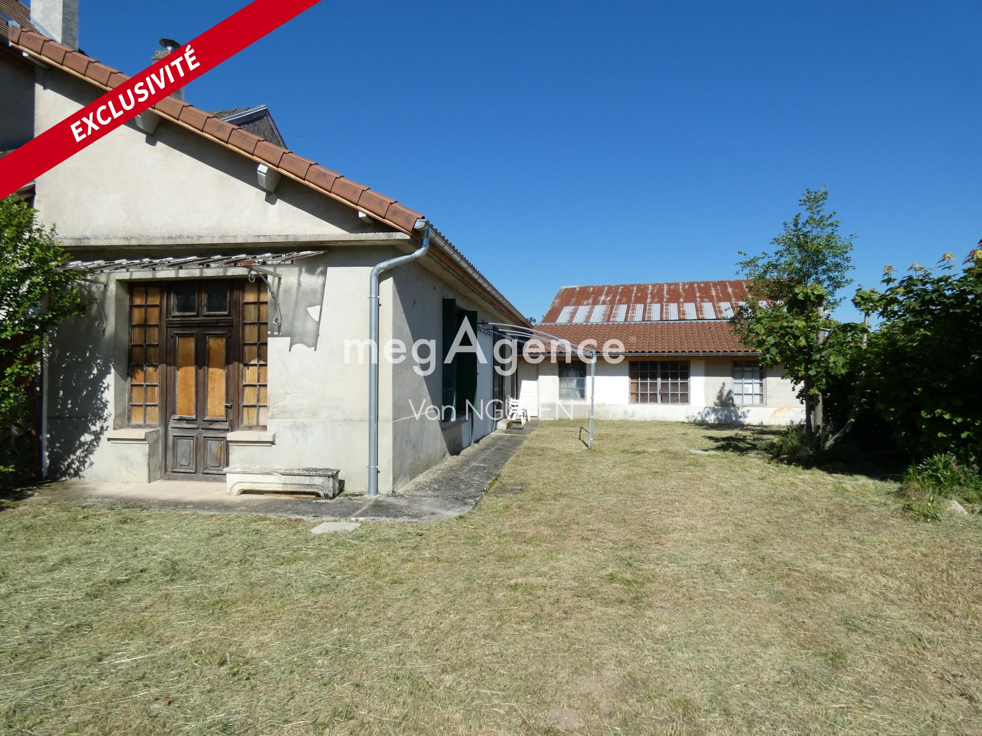 Maison avec potentiel et terrain constructible